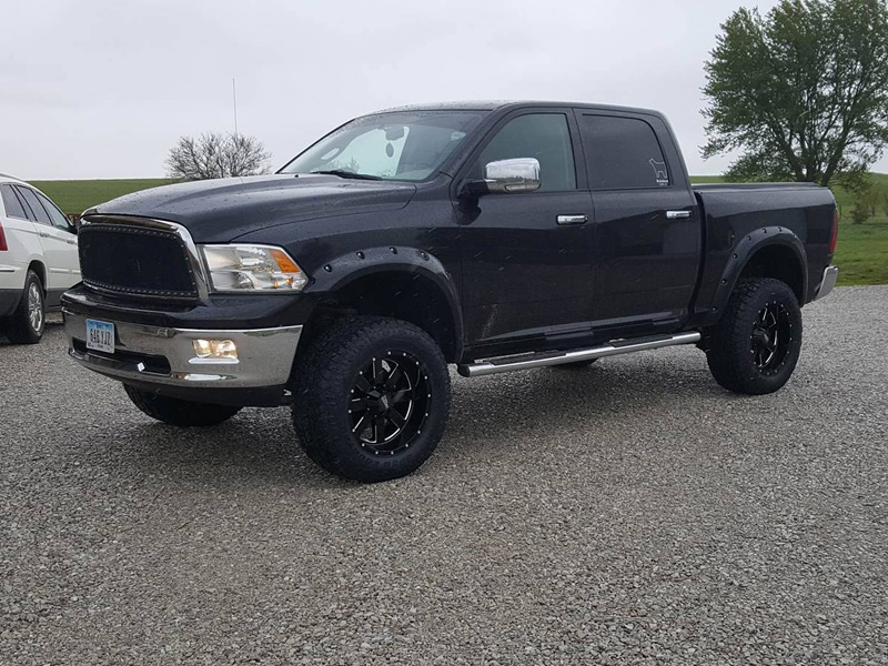 2011 Ram 1500 With 4 Inch Lift Kit Moto Metal 962 20x10  24 Offset 20 By 10 Inch Wide Wheel Toyo Open Country At Ii 35x12 5r20 Tire 
