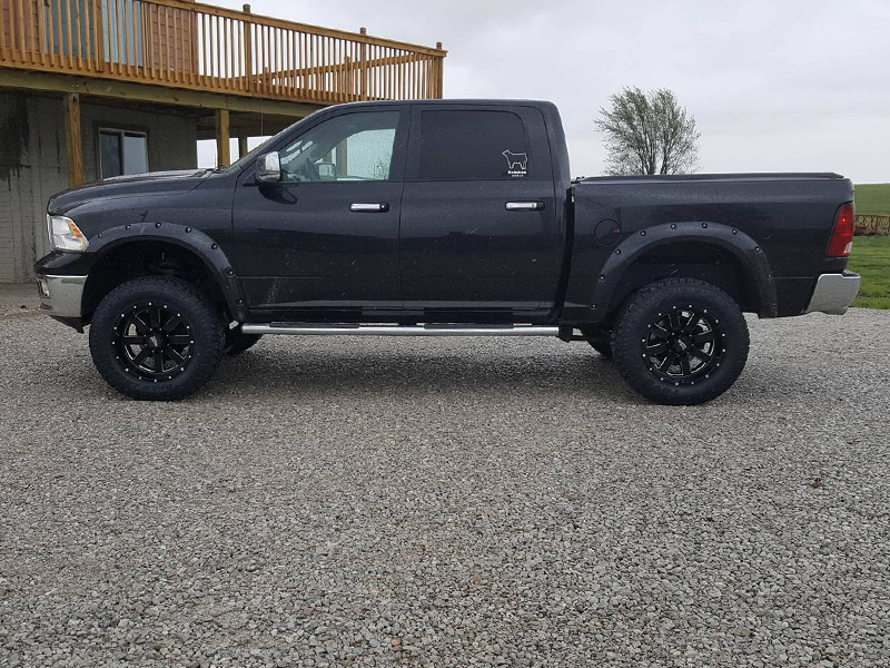 2011 Ram 1500 With 4 Inch Lift Kit Moto Metal 962 20x10  24 Offset 20 By 10 Inch Wide Wheel Toyo Open Country At Ii 35x12 5r20 Tire 