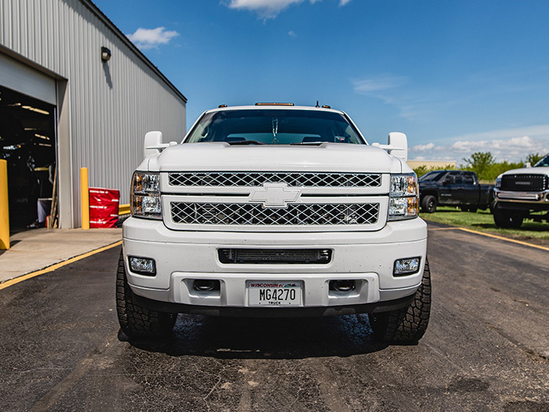 2013 Chevy Silverado 2500hd 2 Inch Rough Country Leveling Kit Hostile Gauntlet 8 Lug Armor Plated 20x12  44 Offset 20 By 12 Inch Wide Wheel Nitto Terra Grappler G2 305 55r20 Tire 