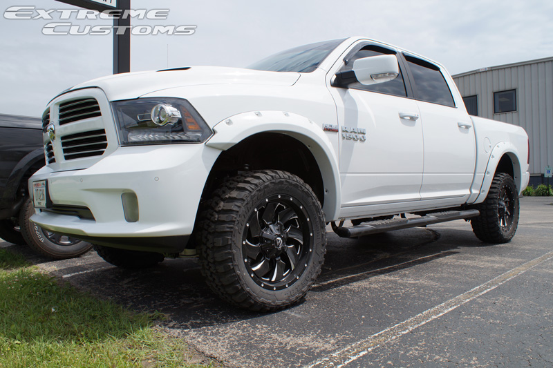 2015 Ram 1500 With 4 Inch Suspension Lift Kit Fuel Offroad Cleaver D574 20x9 +1 Offset 20 By 9 Inch Wide Wheels And Federal 33x12.50r20 33 Inch Tires 