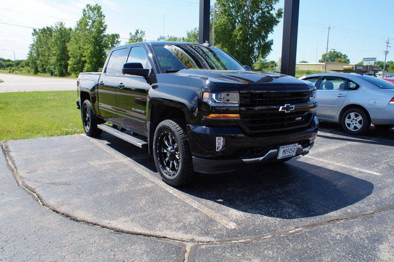 2016 Chevrolet Silverado 1500 With 2 Inch Leveling Kit Fuel Offroad Throttle D513 20x9 20 By 9 +20 Offset Wheels Cooper Discoverer At3 285 55 20 Tires.