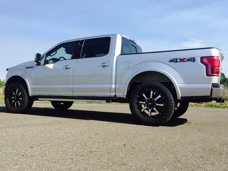 2015 Ford F 150 With 2 5 Inch Rough Country Leveling Kit Moto Metal 970 20x9 +18 Offset 20 By 9 Inch Wide Wheel Nitto Trail Grappler G2 295 60r20 Tire 