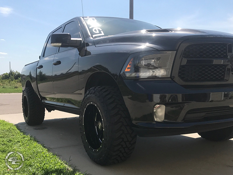 2015 Ram 1500 With 2 5 Inch Rough Country Leveling Kit Moto Metal 962 Mo962b 20x12 44 Offset 20 By 12 Inch Wide Wheel Toyo Open Country Mt 35x12 5r20 Tire 