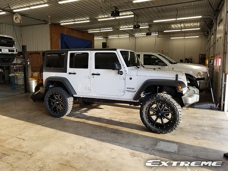 2016 Jeep Wrangler - 22x10 Fuel Offroad Wheels  Nitto Tires Rough  Country 4-inch Suspension Lift Kit