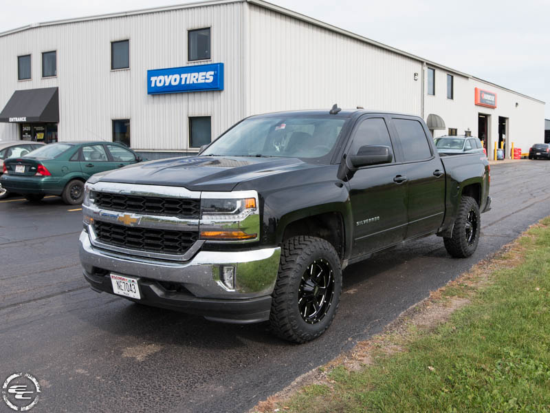 2017 Chevy Silverado 1500 With 2 Inch Rough Country Leveling Kit Moto Metal 962 Mo962b 18x9 0 Offset 18 By 9 Inch Wide Wheel Atturo Trail Blade Mt 275 65r18 Tire 