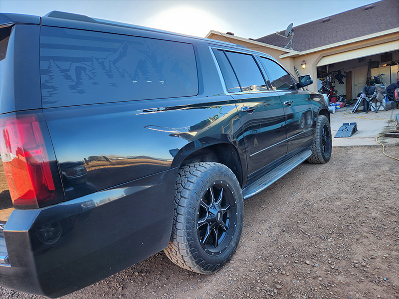 2017 Chevrolet Suburban - 20x9 Moto Metal Wheels LT265/60R20 Toyo